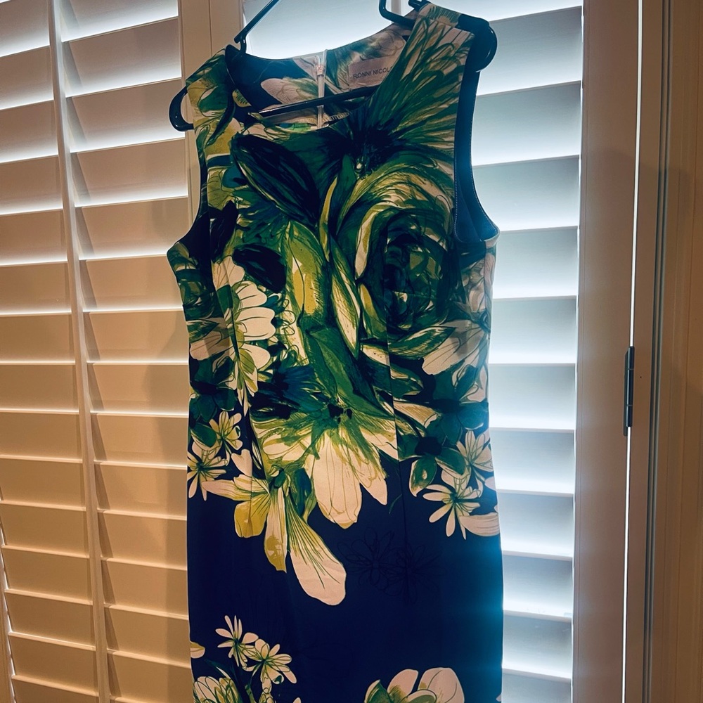 The dress was only worn once, gently used. Size 12.